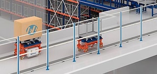 Le grillage de sécurité délimite le circuit de convoyeurs aériens et au sol