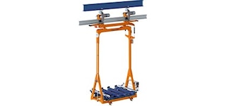 Les navettes aériennes se déplacent le long d'un rail accroché au plafond du local