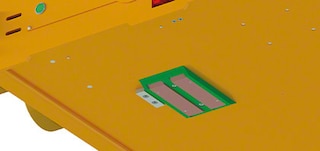 Les balais de contact servent au chargement automatique de la navette Les balais de contact servent au chargement automatique de la navette